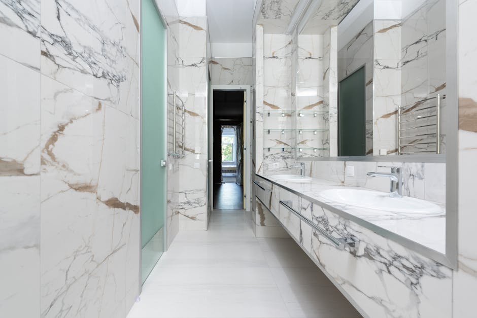 Precision marble bathroom floor tile installation
